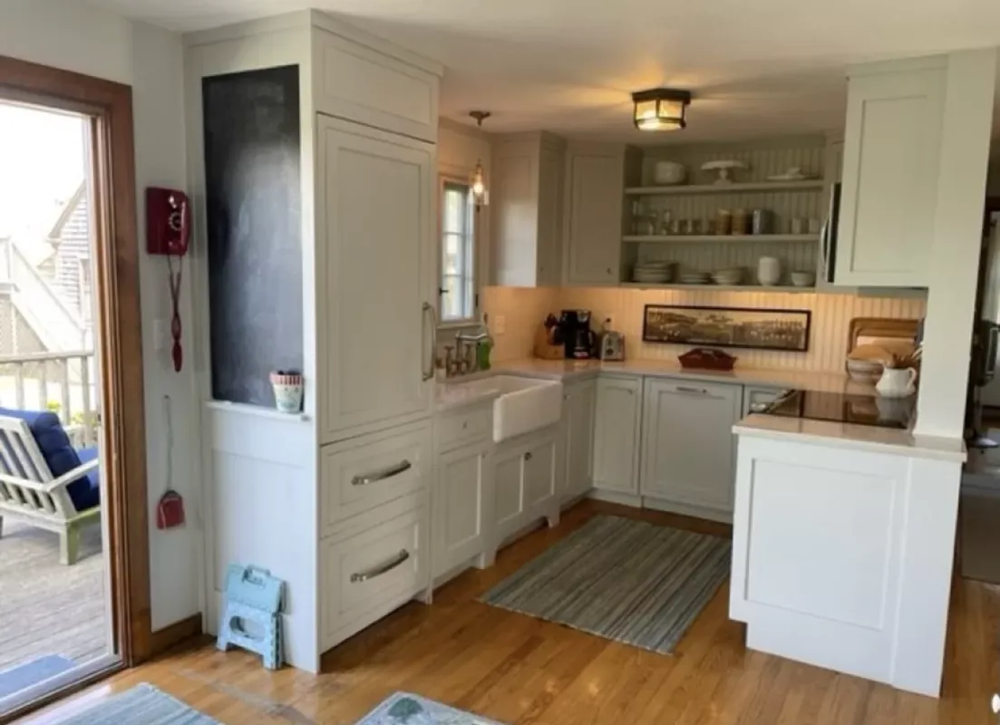 Classic cape style home with open living design — photo 5